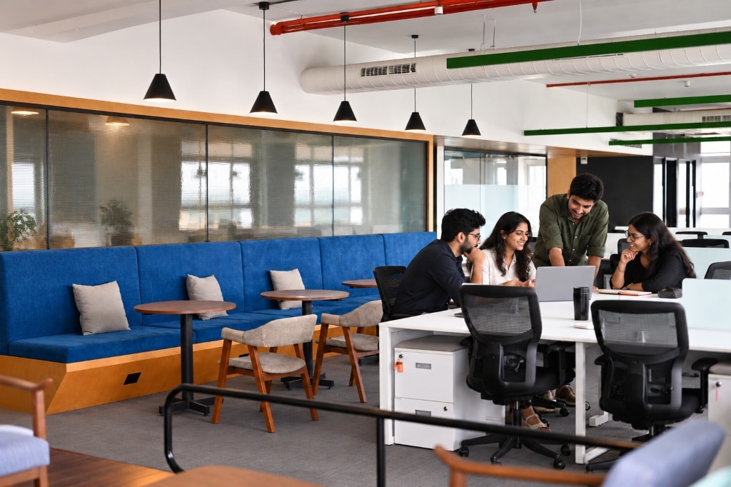 GharPadharo team collaborating in modern office