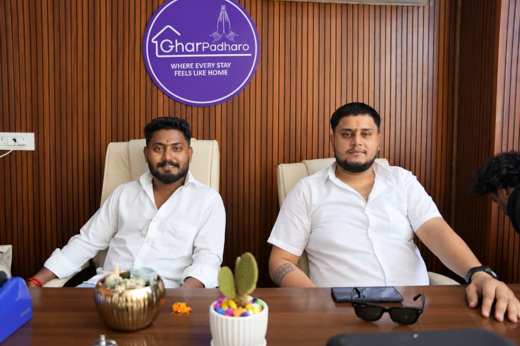 GharPadharo team members collaborating at office desk